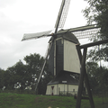 Storm bij de molen van Rosmalen op een regenachtige dag