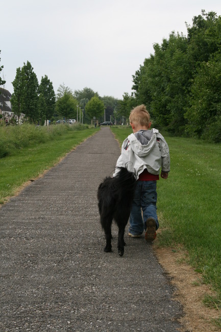 Zoonlief met onze trouwe viervoeter aantal jaar geleden.
