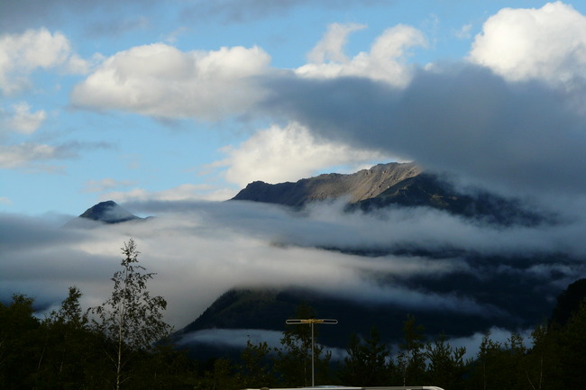 in de wolken; zo hoog en heerlijk